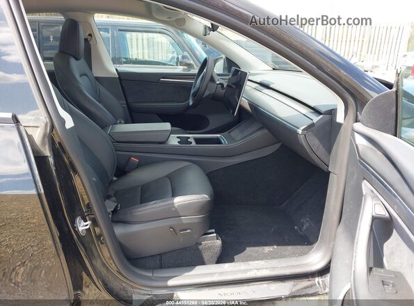 7SAYGDEE8PF834963 2023 TESLA MODEL Y Black Widok wnętrza z przodu