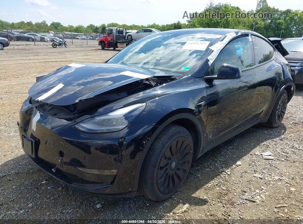 7SAYGDEE8PF834963 2023 TESLA MODEL Y Black Przód lewy