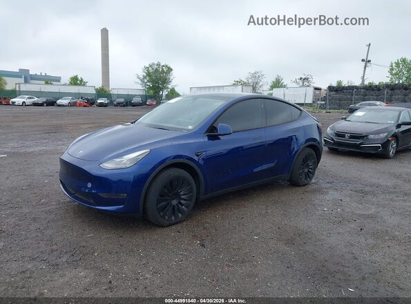 7SAYGDEE8RA280081 2024 TESLA MODEL Y Blue Vista tres cuartos delantera izquierda