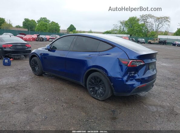 7SAYGDEE8RA280081 2024 TESLA MODEL Y Blue Trasero izquierdo