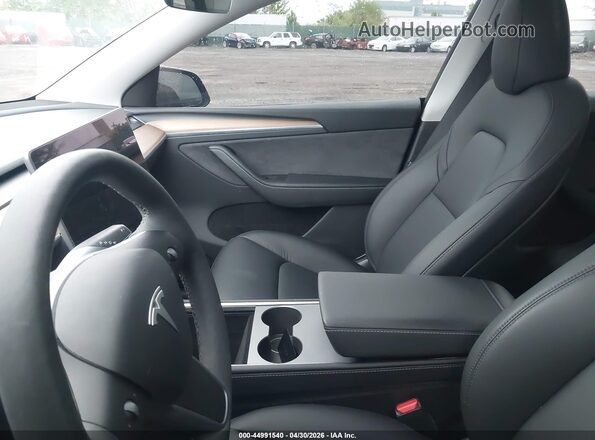7SAYGDEE8RA280081 2024 TESLA MODEL Y Blue Vista del salpicadero