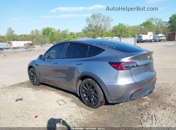 7SAYGDEE8RA299293 2024 TESLA MODEL Y Silver Trasero izquierdo