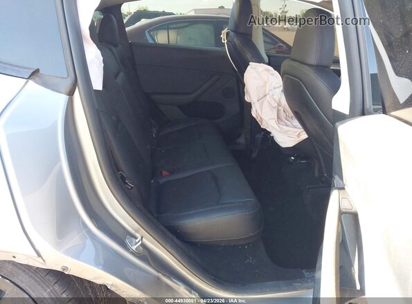7SAYGDEE8RA299293 2024 TESLA MODEL Y Silver Vista de la etiqueta del VIN