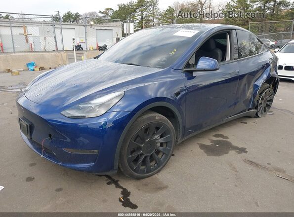7SAYGDEE9PF766981 2023 TESLA MODEL Y Dark Blue Vista tres cuartos delantera izquierda