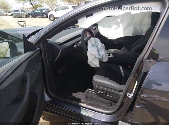 7SAYGDEE9TA668105 2026 TESLA MODEL Y Gray Widok wnętrza z przodu