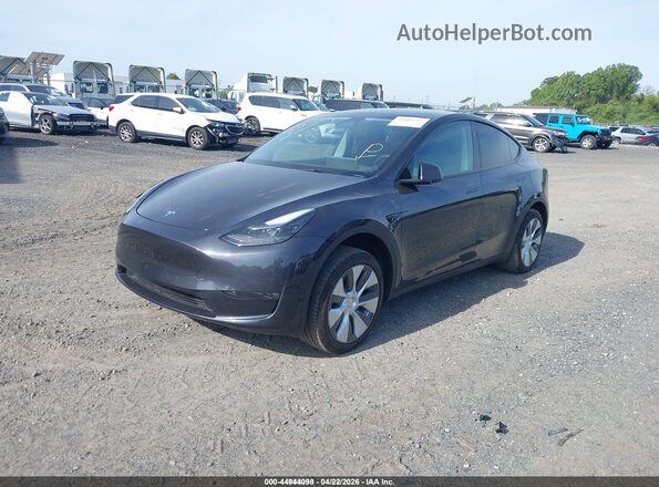 7SAYGDEEXRA262679 2024 TESLA MODEL Y Gray Vista tres cuartos delantera izquierda
