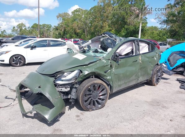 7SAYGDEF3RA311889 2024 TESLA MODEL Y Зеленый Передняя левая четверть