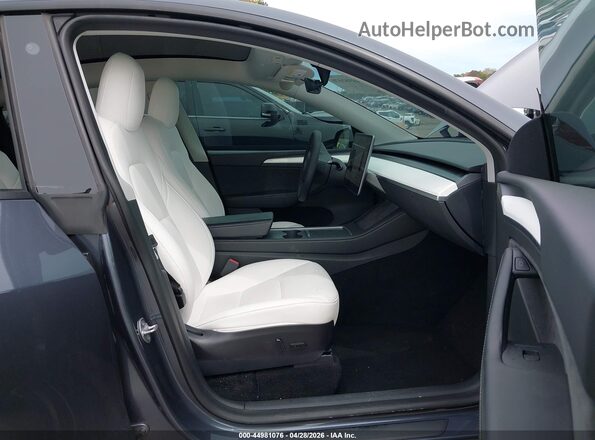 7SAYGDEF4PF647213 2023 TESLA MODEL Y Gray Vista interior delantera
