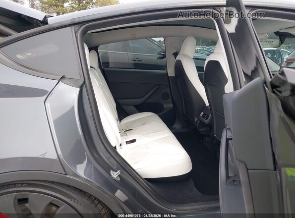 7SAYGDEF4PF647213 2023 TESLA MODEL Y Gray Vista de la etiqueta del VIN