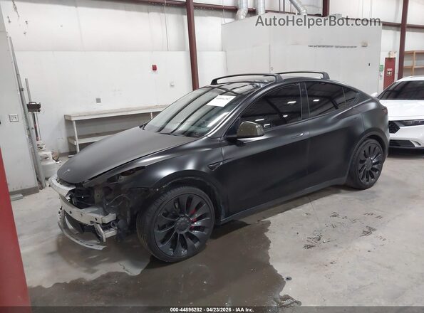 7SAYGDEF7NF553940 2022 TESLA MODEL Y Black წინა მარცხენა ხედი სამი მეოთხედიდან