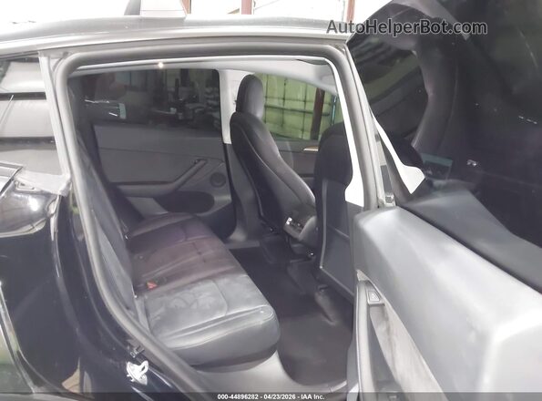 7SAYGDEF7NF553940 2022 TESLA MODEL Y Black VIN კოდის სტიკერის ხედი