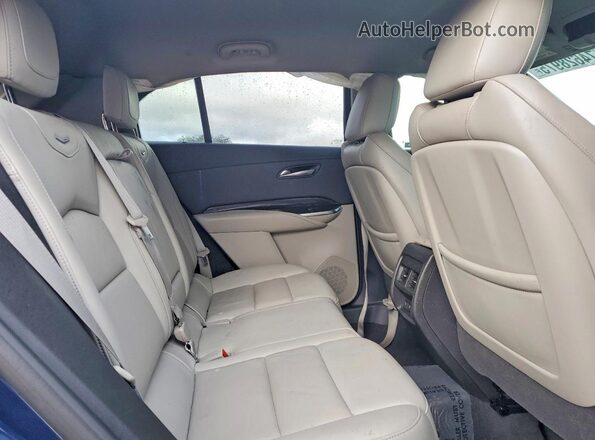 1GYFZCR43MF028086 2021 CADILLAC XT4 Blue Engine compartment view