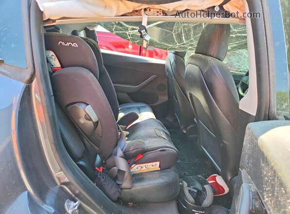 5YJYGDEE9MF077368 2021 TESLA MODEL Y Gray Widok wnętrza z tyłu