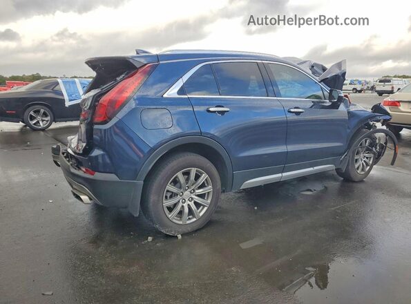 1GYFZCR43MF028086 2021 CADILLAC XT4 Blue Front right