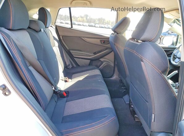 JF2GTABCXJH219829 2018 SUBARU CROSSTREK White Vista de los asientos traseros