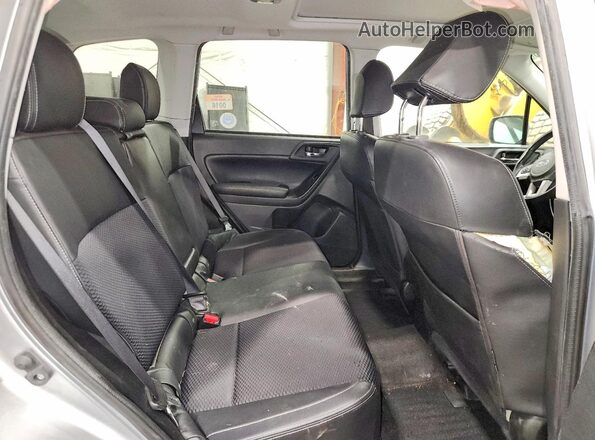 JF2SJGEC7JH614811 2018 SUBARU FORESTER2. Silver Rear interior view
