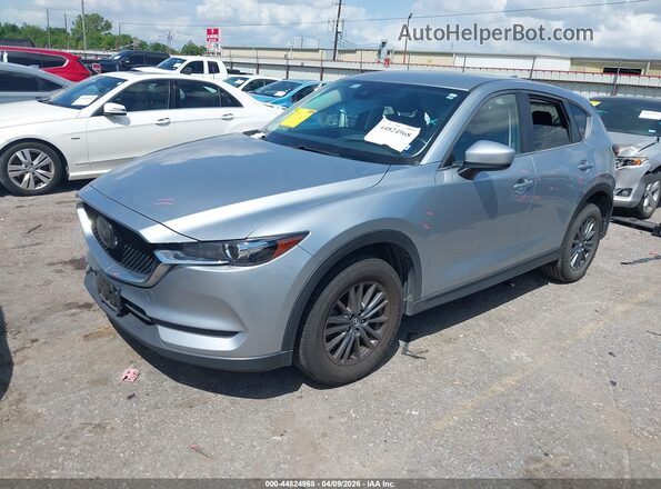 JM3KFACM7M0359239 2021 MAZDA CX-5 Silver წინა მარცხენა ხედი სამი მეოთხედიდან