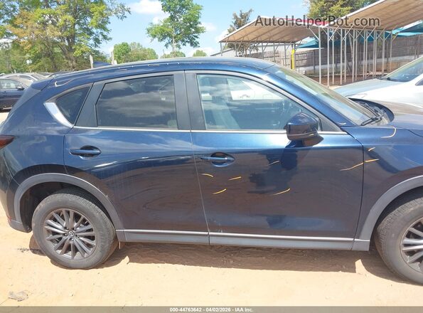 JM3KFACM9M1385979 2021 MAZDA CX-5 Blue Rear interior view