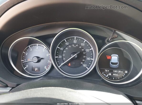 JM3KFADL4H0208063 2017 MAZDA CX-5 Burgundy Widok tylnych siedzeń