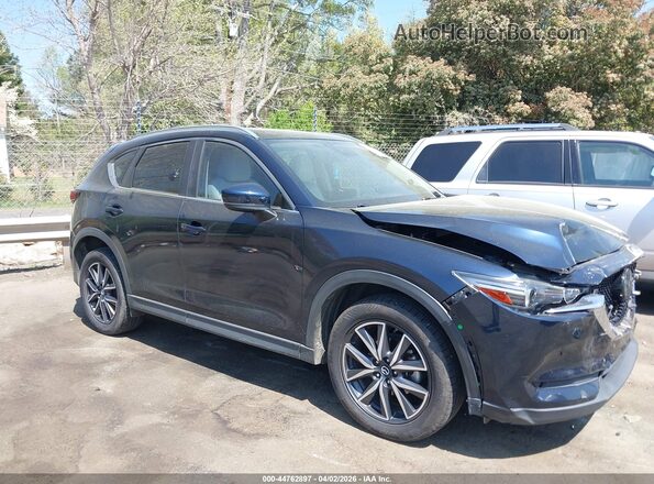 JM3KFADM4J1413309 2018 MAZDA CX-5 Blue Vista interior trasera