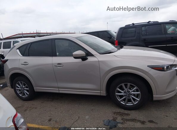 JM3KFBBL0S0590463 2025 MAZDA CX-5 Tan Vista interior trasera