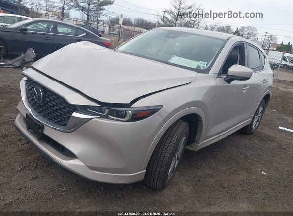 JM3KFBCL7S0675783 2025 MAZDA CX-5 Champagne Առջևի ձախ երեք քառորդ տեսարան