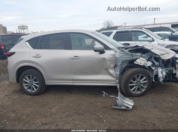 JM3KFBCL7S0675783 2025 MAZDA CX-5 Champagne Սալոնի հետևի տեսք