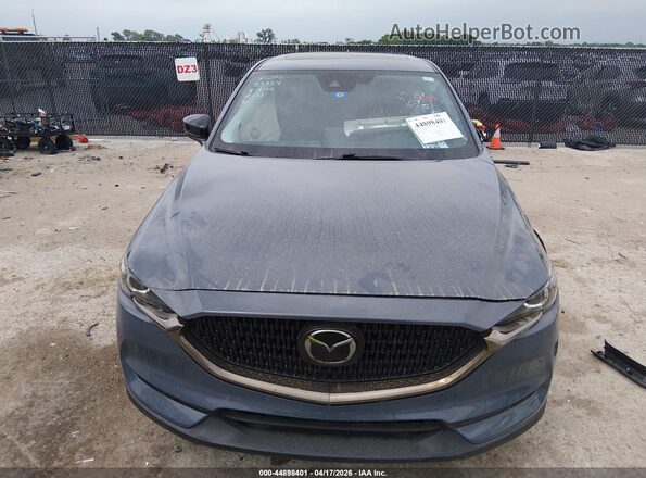 JM3KFBCM5M0433005 2021 MAZDA CX-5 Gray Vista del salpicadero