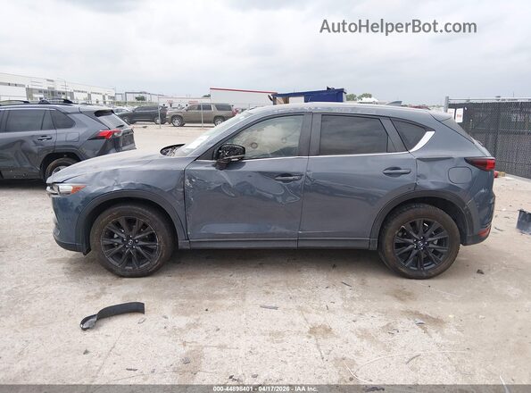 JM3KFBCM5M0433005 2021 MAZDA CX-5 Gray Vista interior trasera