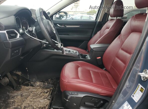 JM3KFBCY7M0428813 2021 MAZDA CX-5 Blue Front interior view