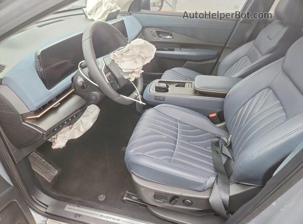 JN1DF0CD0RM741319 2024 NISSAN ARIYA Gray Vista interior delantera