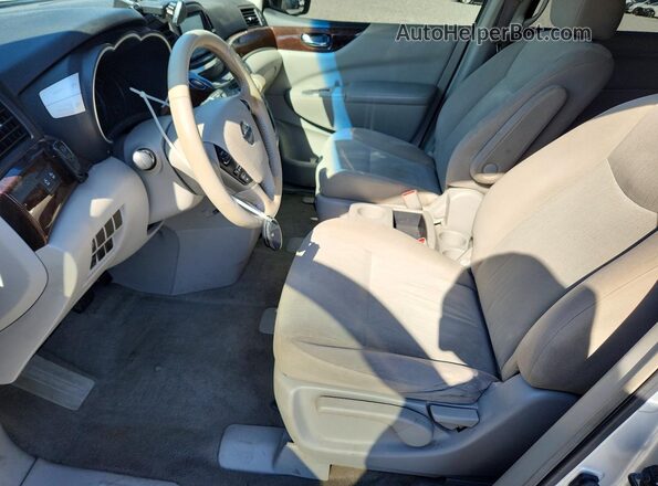 JN8AE2KP2G9154666 2016 NISSAN QUEST Silver Front interior view