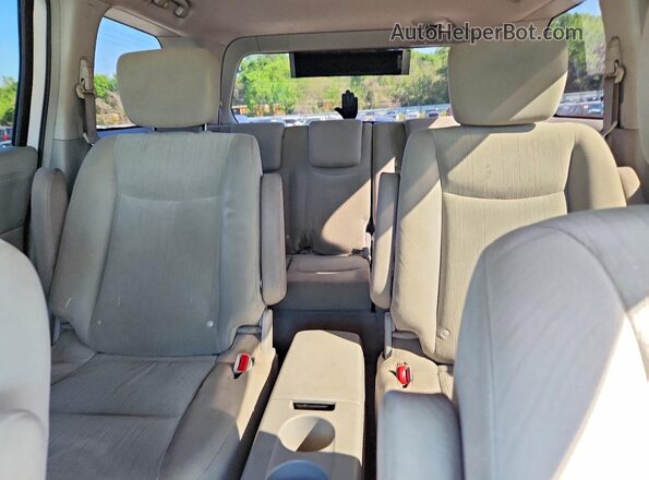 JN8AE2KP2G9154666 2016 NISSAN QUEST Silver Rear seats view