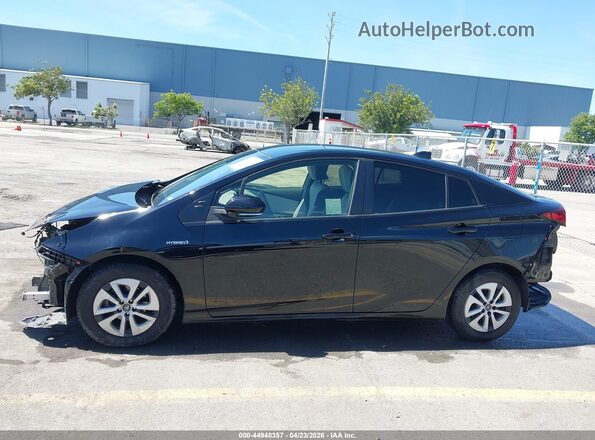 JTDKAMFU3M3134593 2021 TOYOTA PRIUS Black 