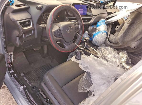 JTHB9JBH2R2077654 2024 LEXUS UX Silver Вид панелі приладів