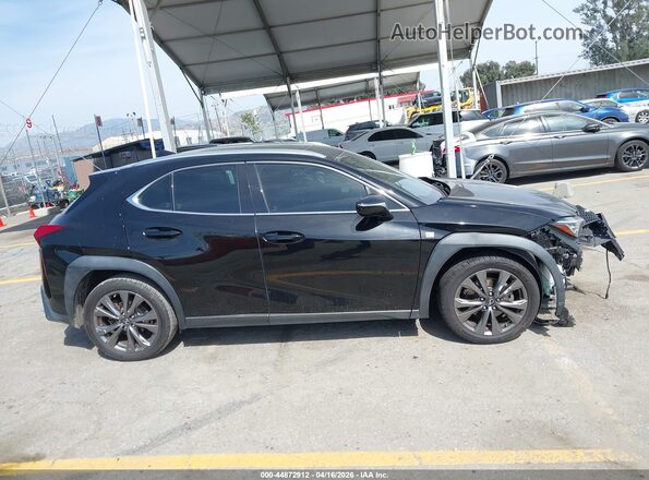 JTHY3JBH5K2004876 2019 LEXUS UX 200 Black Widok wnętrza z tyłu