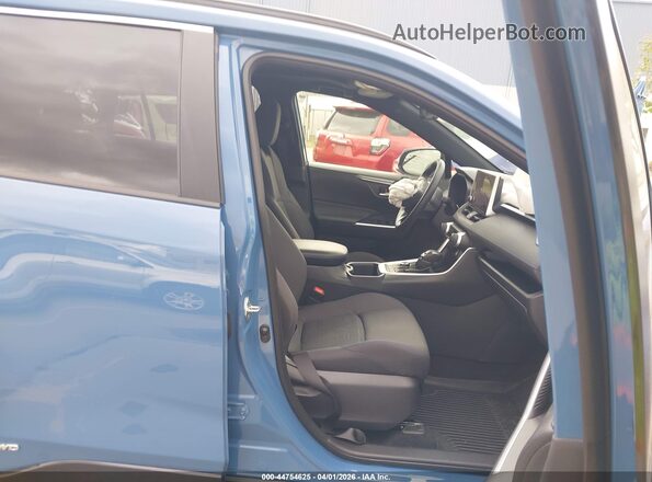 JTM16RFV8PD088972 2023 TOYOTA RAV4 HYBRID Blue Вид салону спереду