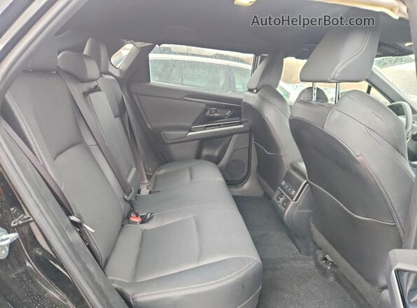 JTMABABA0RA057137 2024 SUBARU SOLTERRA Black Widok wnętrza z tyłu