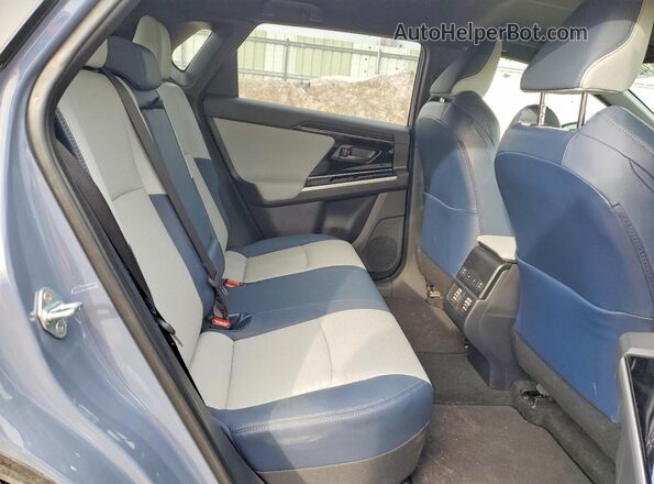 JTMABABA5RA052547 2024 SUBARU SOLTERRA Blue Vista interior trasera