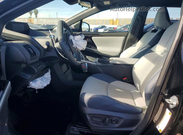 JTMABABA9RA065186 2024 SUBARU SOLTERRA Black Widok wnętrza z przodu