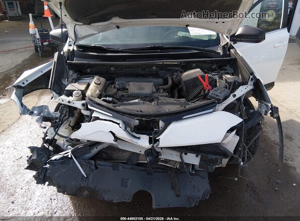 JTMBFREV3HJ119599 2017 TOYOTA LE White Rear view