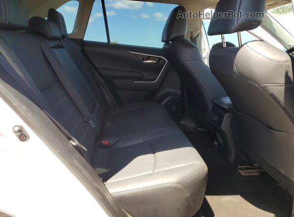JTMC1RFV2RJ028701 2024 TOYOTA LE White Rear interior view