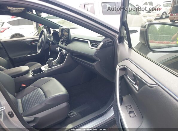 JTME6RFV4PD542572 2023 TOYOTA RAV4 HYBRID Silver Front interior view