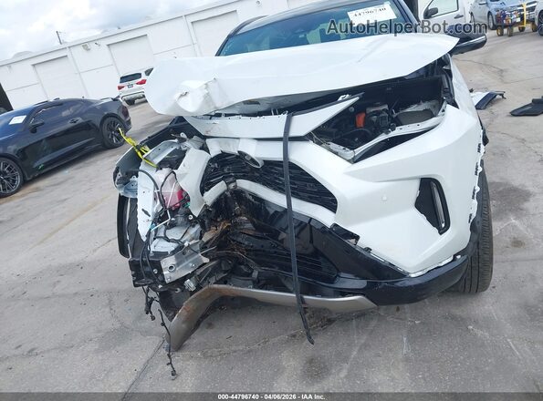JTME6RFV4SD573782 2025 TOYOTA RAV4 HYBRID White Rear interior view