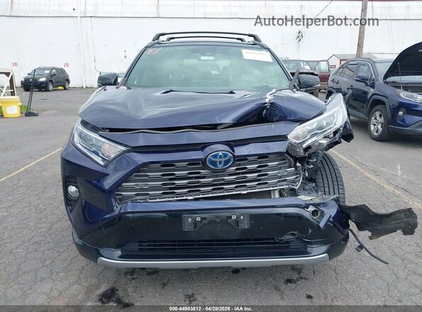JTME6RFVXMD512777 2021 TOYOTA RAV4 HYBRID Blue Вид задньої частини салону