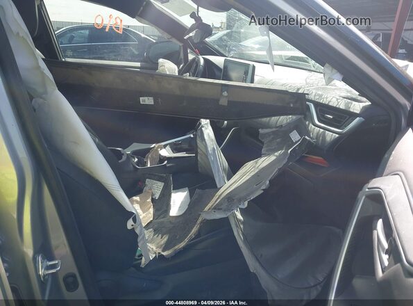 JTMEWRFVXKD517555 2019 TOYOTA RAV4 HYBRID Серебряный Вид салона спереди
