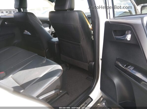 JTMJFREV0GJ070971 2016 TOYOTA RAV4 White Vista de la etiqueta del VIN