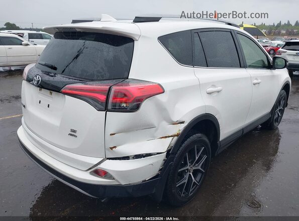 JTMJFREV0JJ227602 2018 TOYOTA RAV4 White Front view