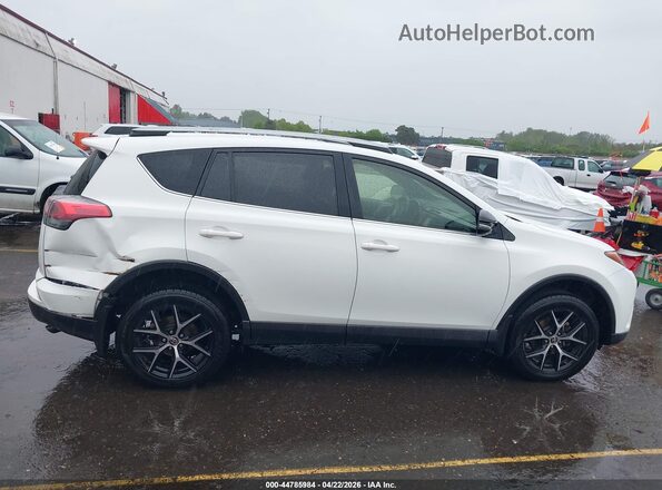 JTMJFREV0JJ227602 2018 TOYOTA RAV4 White Rear interior view
