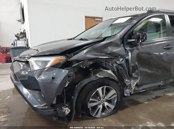 JTMRFREV0GJ077499 2016 TOYOTA LE Серый Вид спереди